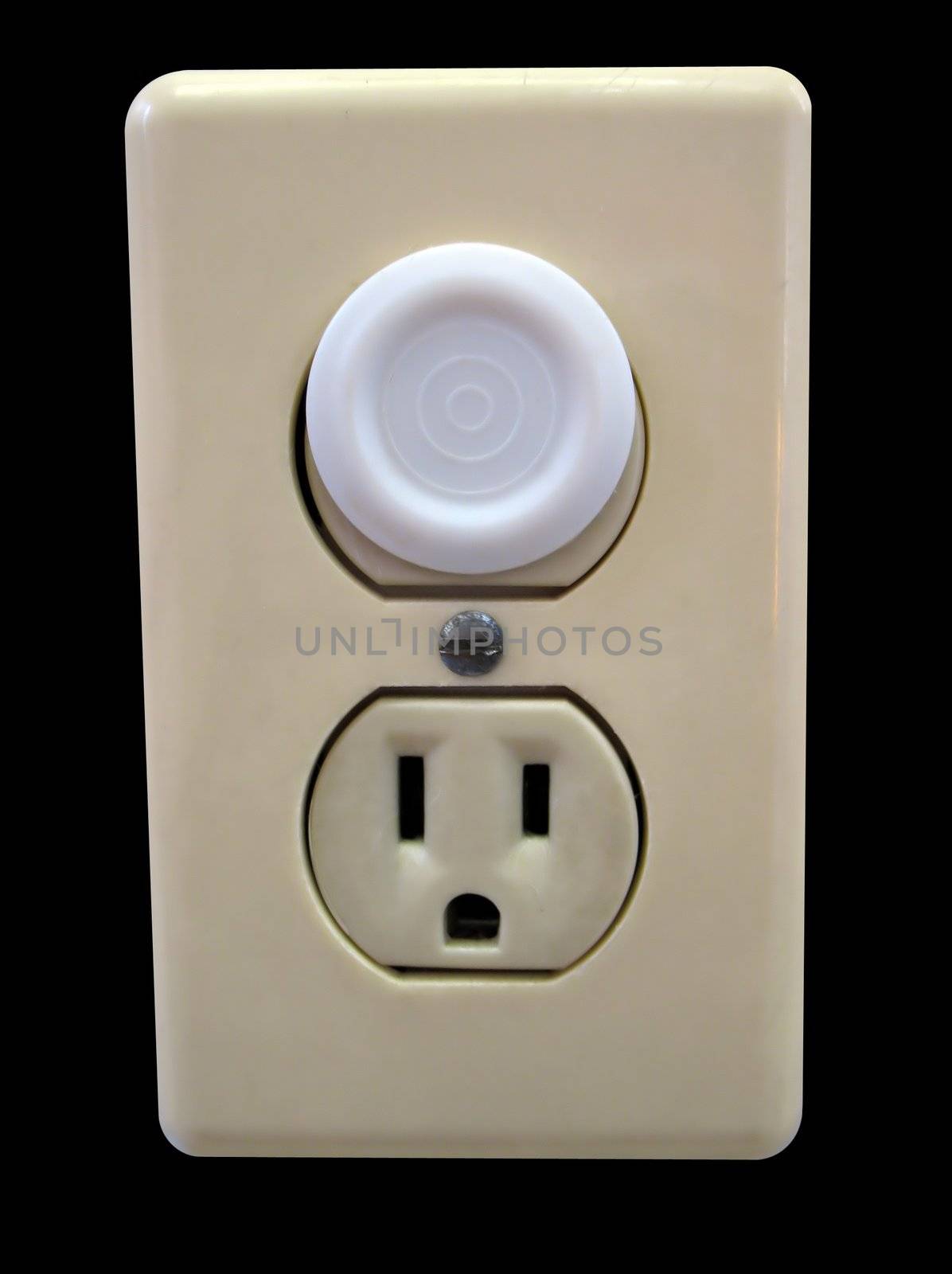 an electrical outlet complete with child safety plug - isolated over black