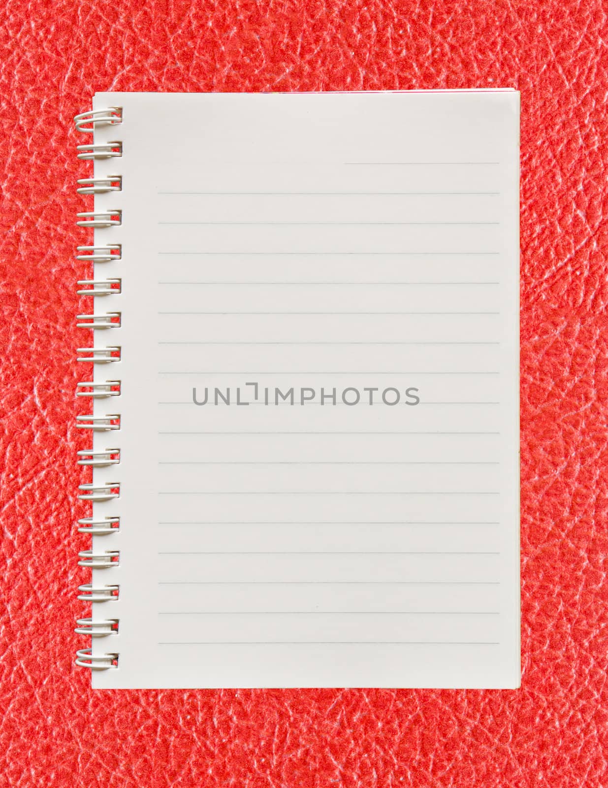 Blank paper with on  red leather background