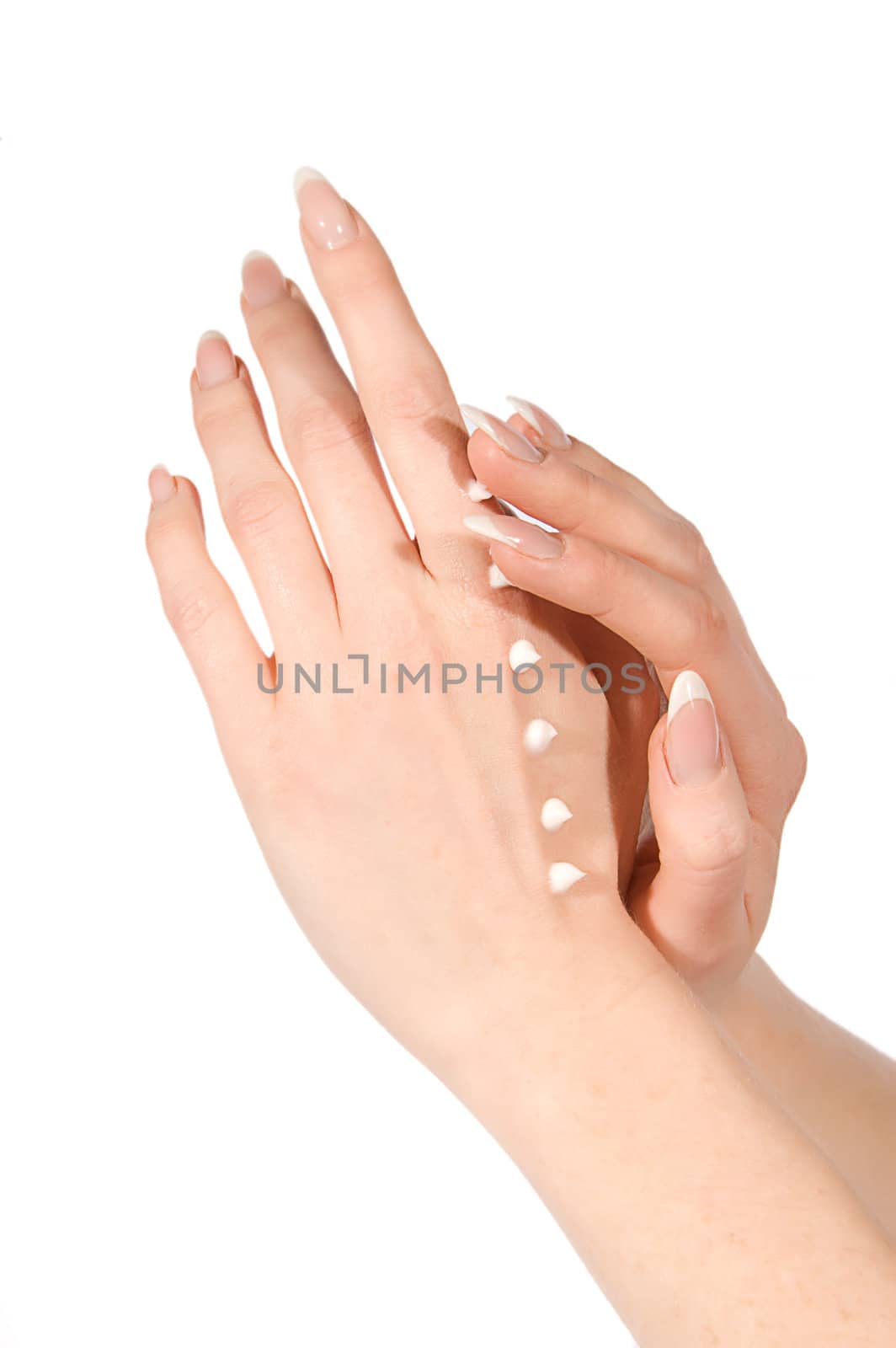 Hands applying cream by Angel_a