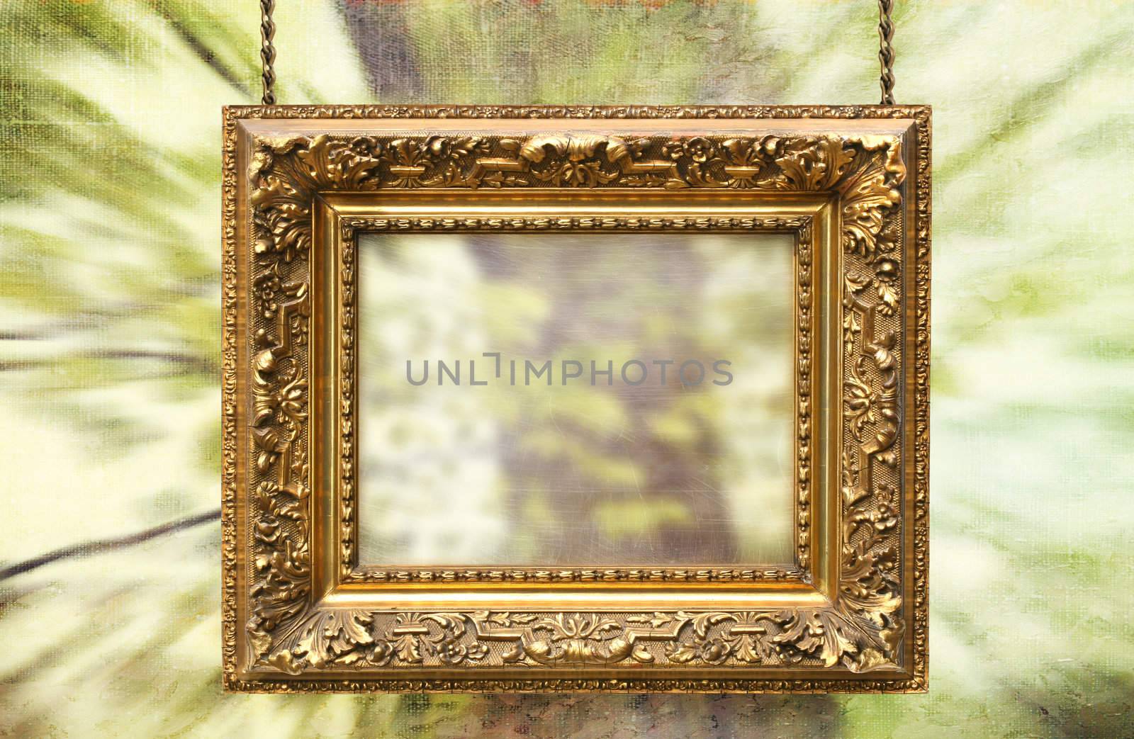 Gilded frame hanging with spring abstract background by Sandralise