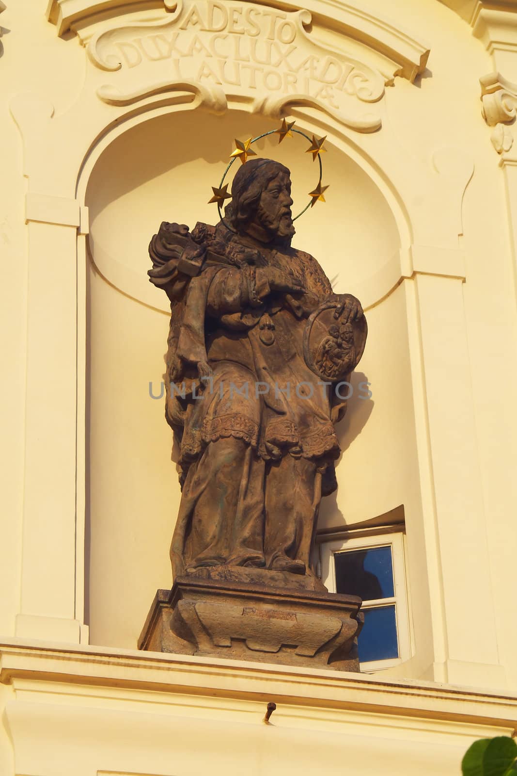 historic building, stucco on the walls, a statue