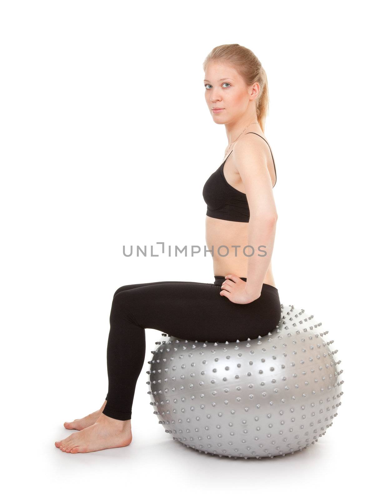 athletic girl with a big silver ball