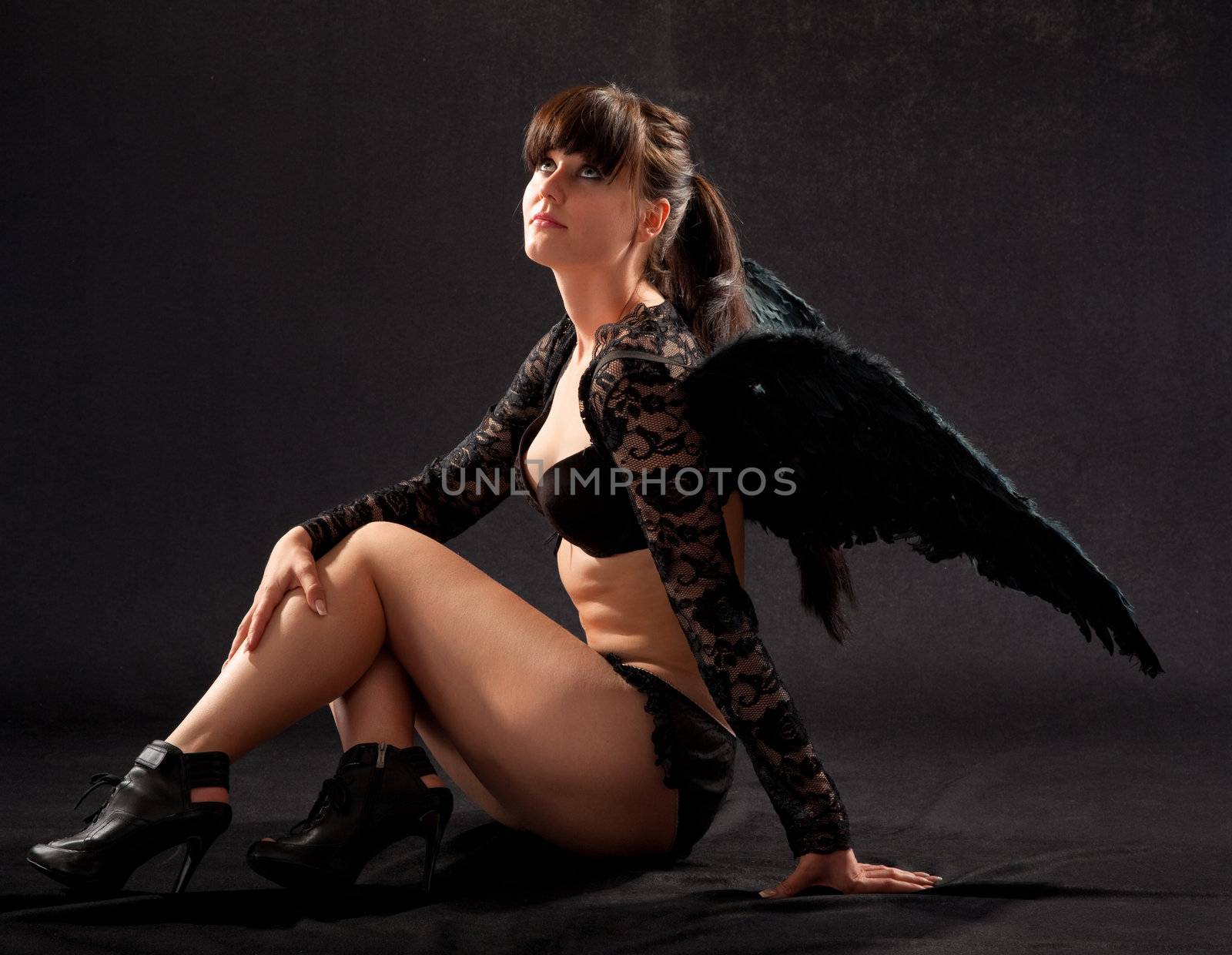 girl in black underwear and black wings  by Sergieiev