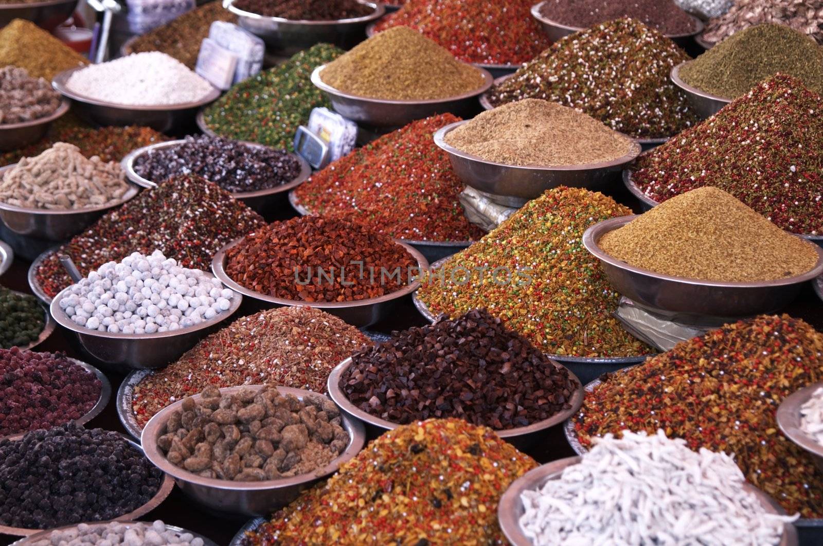Bowls of pulses and spices on a market stall in Ahmadabad, Gujarat, India