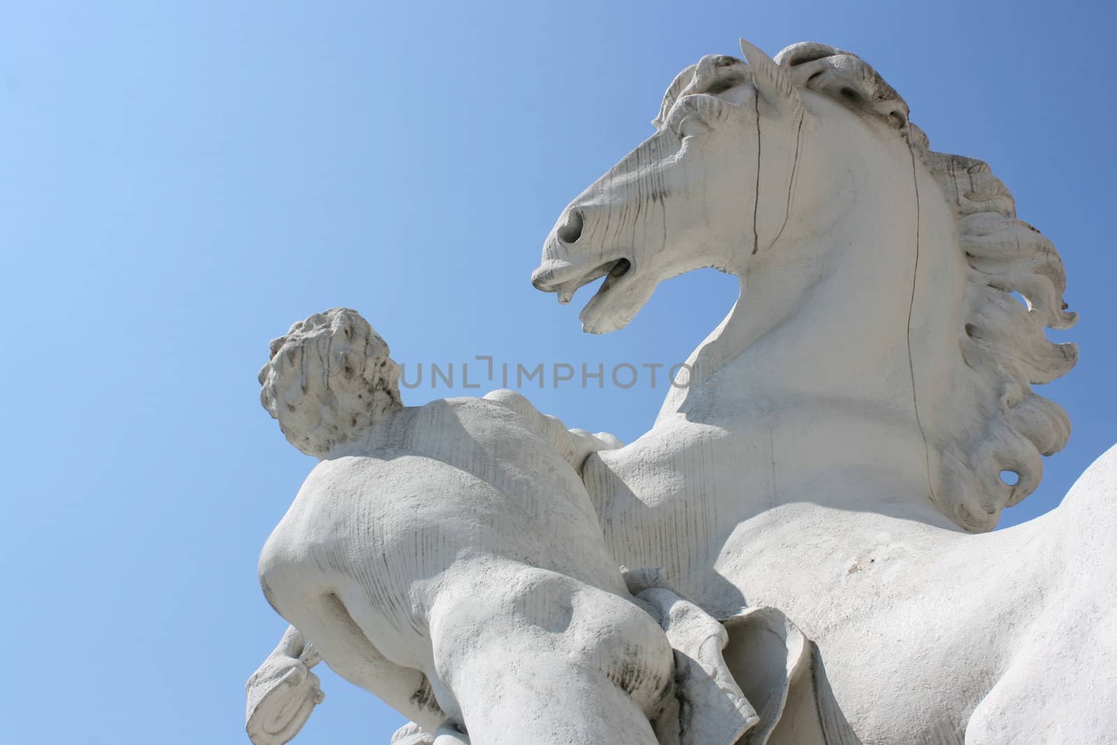 Detail of monument of horse and man. Sculpture is placed in front of Belvedere castle, Vienna, Austria