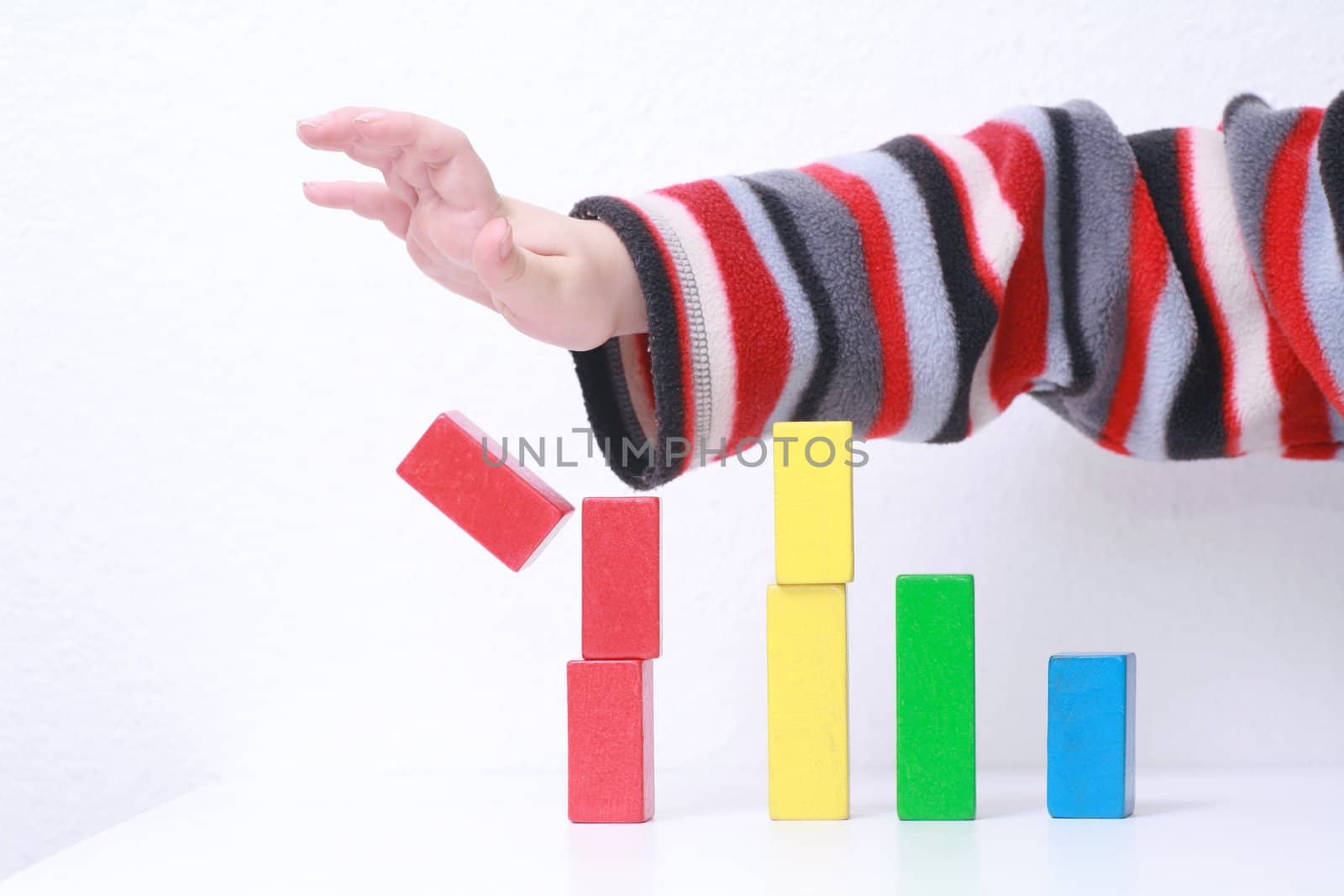 sales charts symbolized by wood toys............