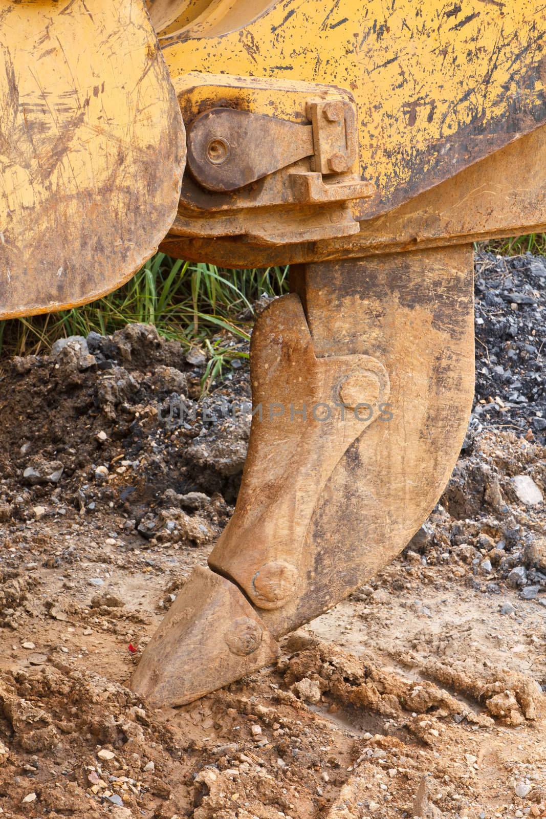 Bulldozer working in mine by stoonn