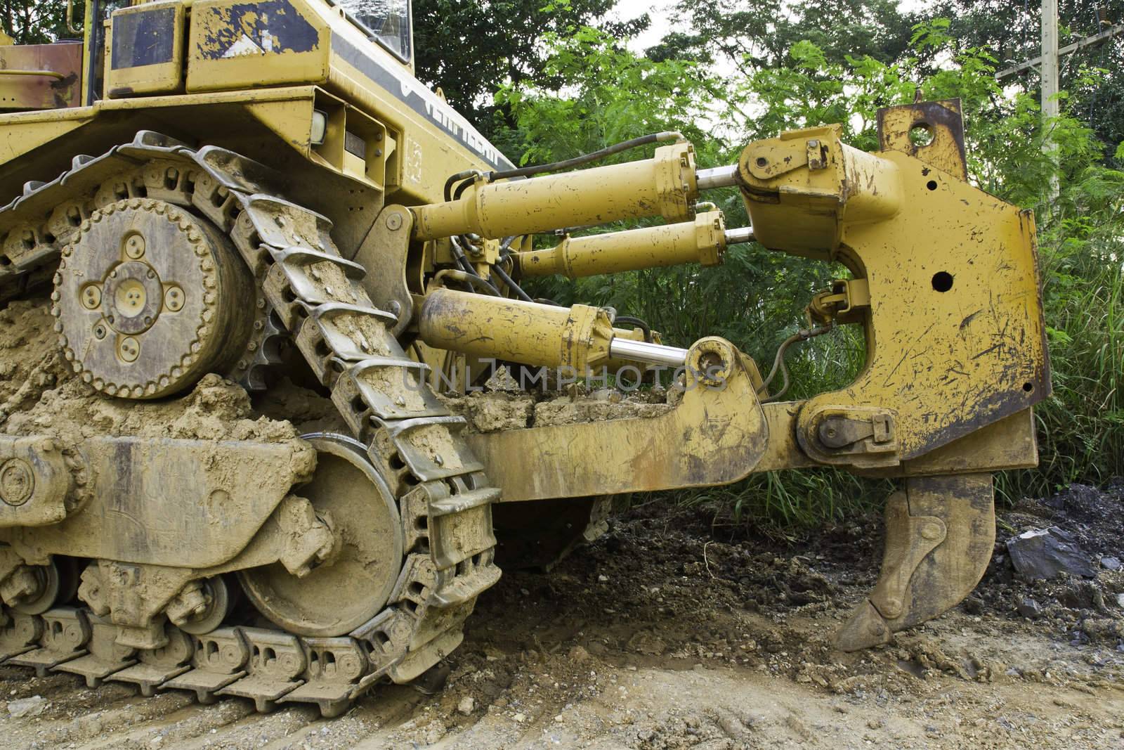 Bulldozer working in mine by stoonn