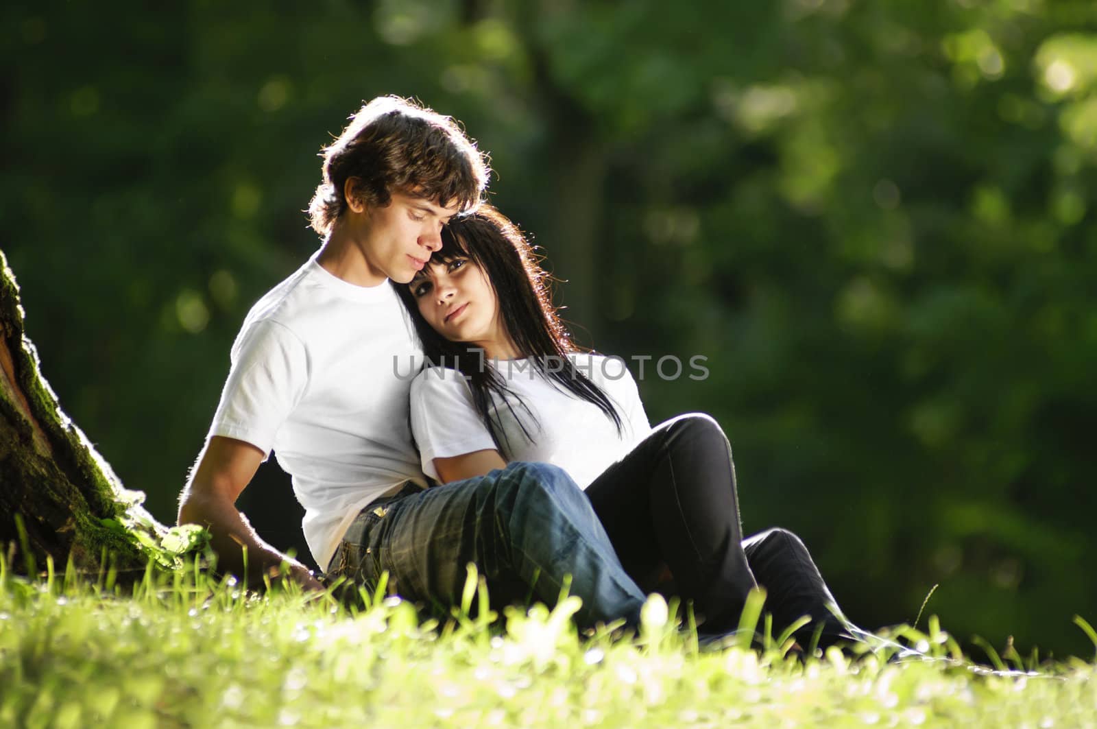 Happy young couple enjoying at park