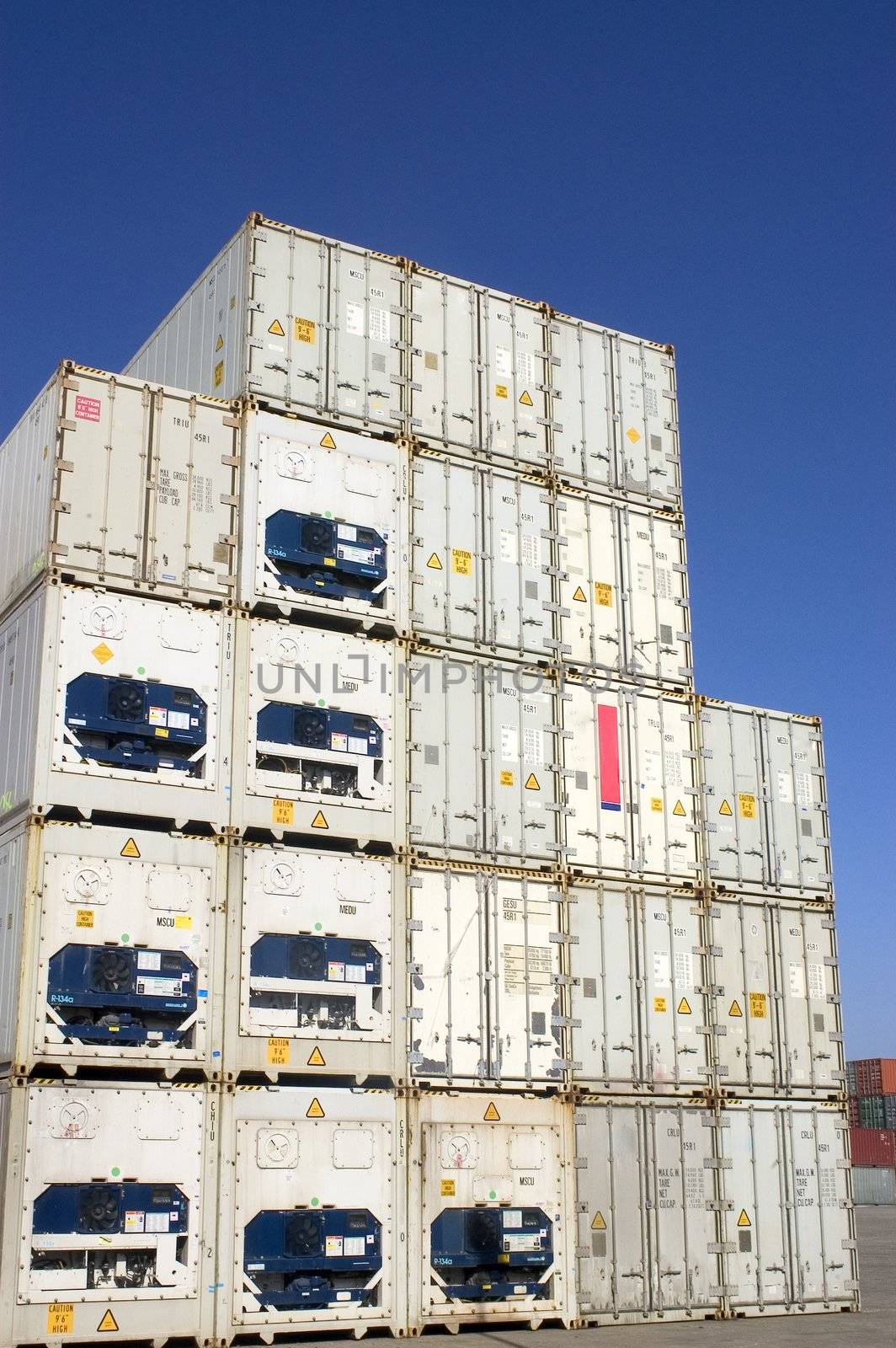 containers at the port for shipment by gillespaire