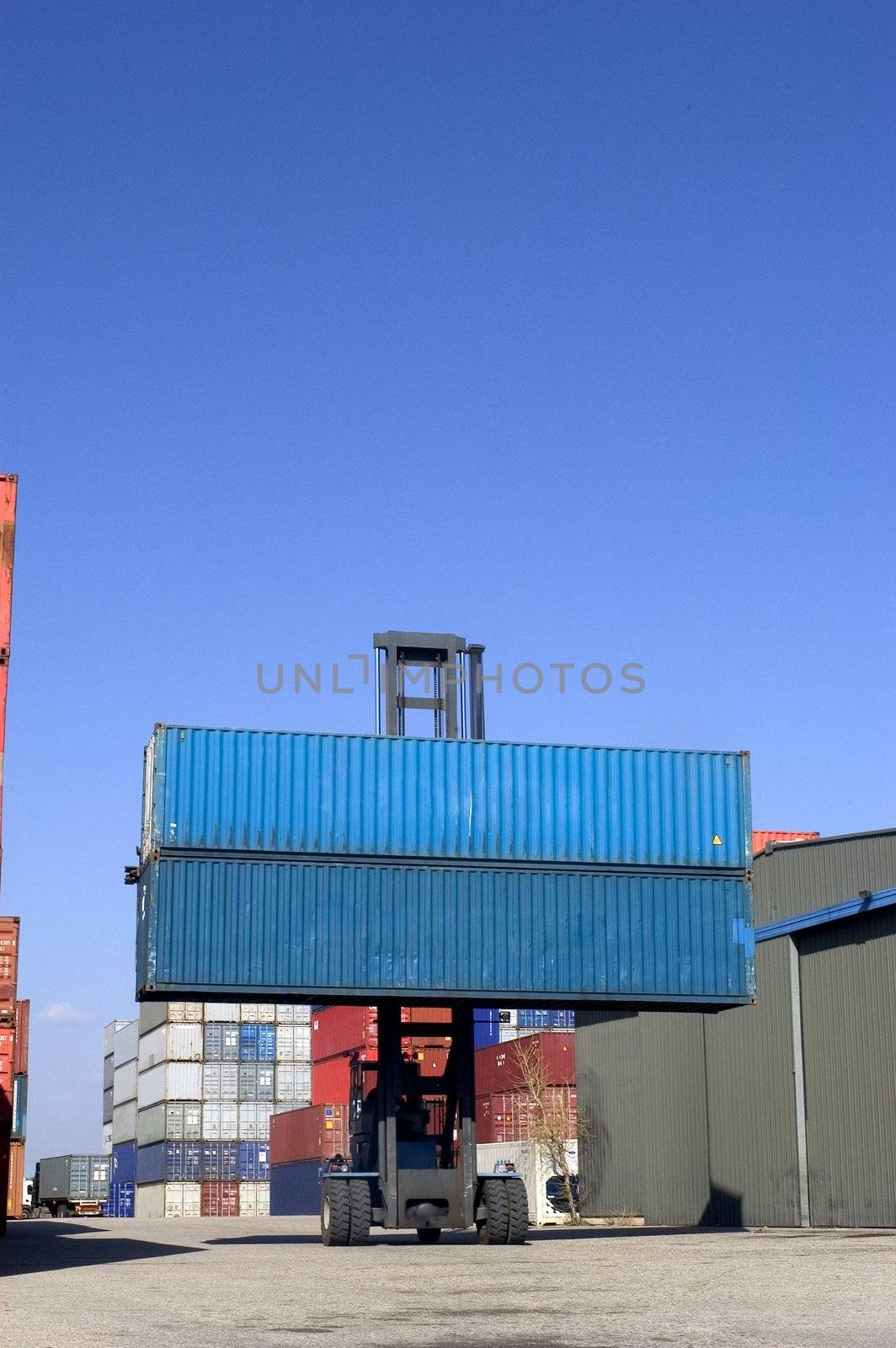 containers at the port for shipment by gillespaire