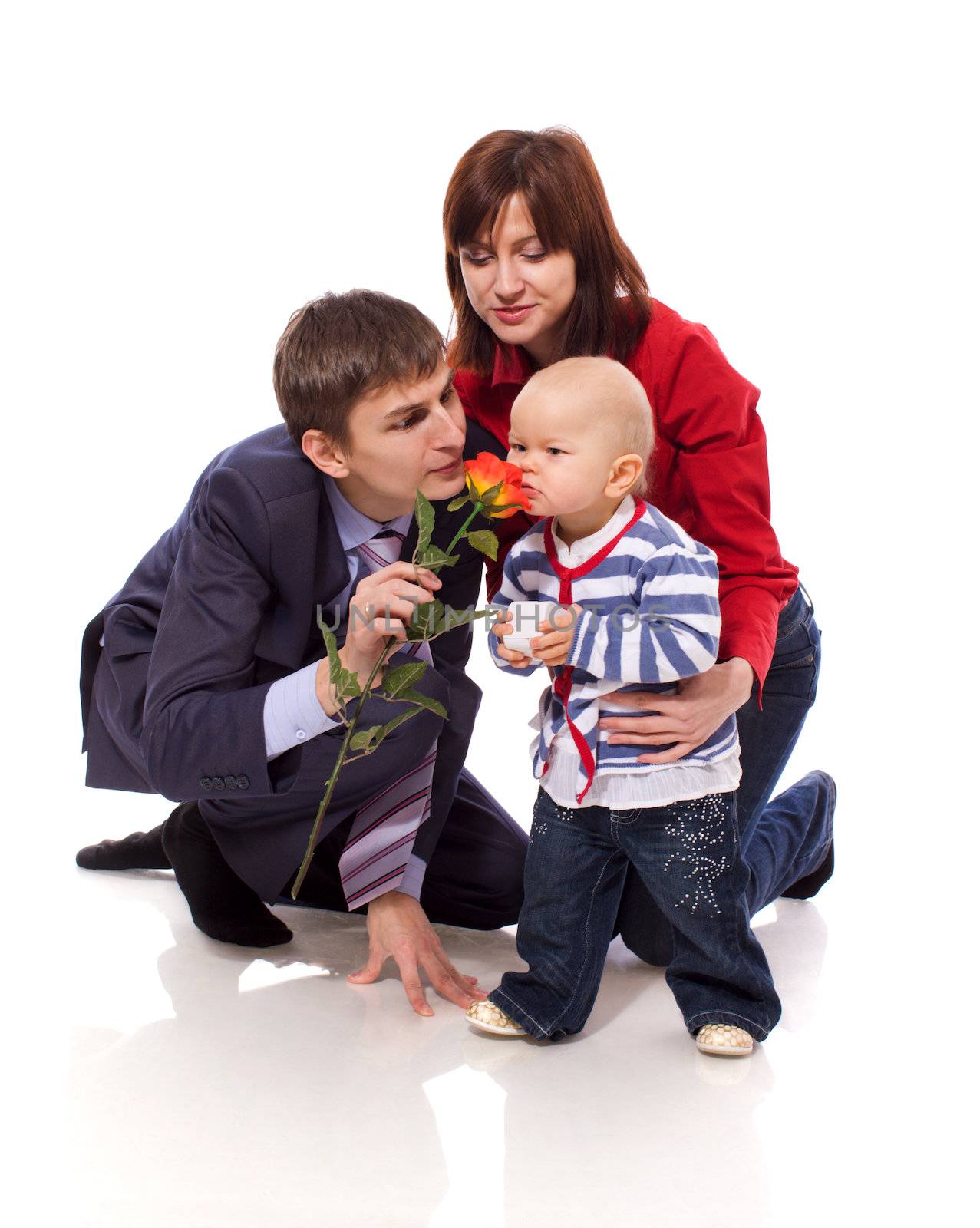 Happy Family posing together isolated on white