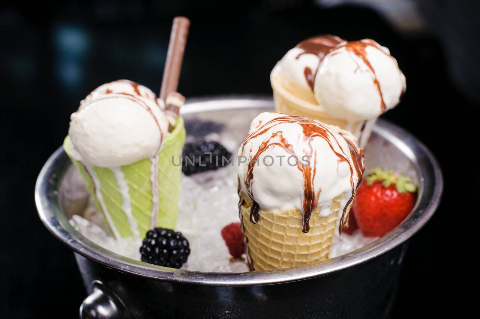 Ice cream in an ice bucket and fruit