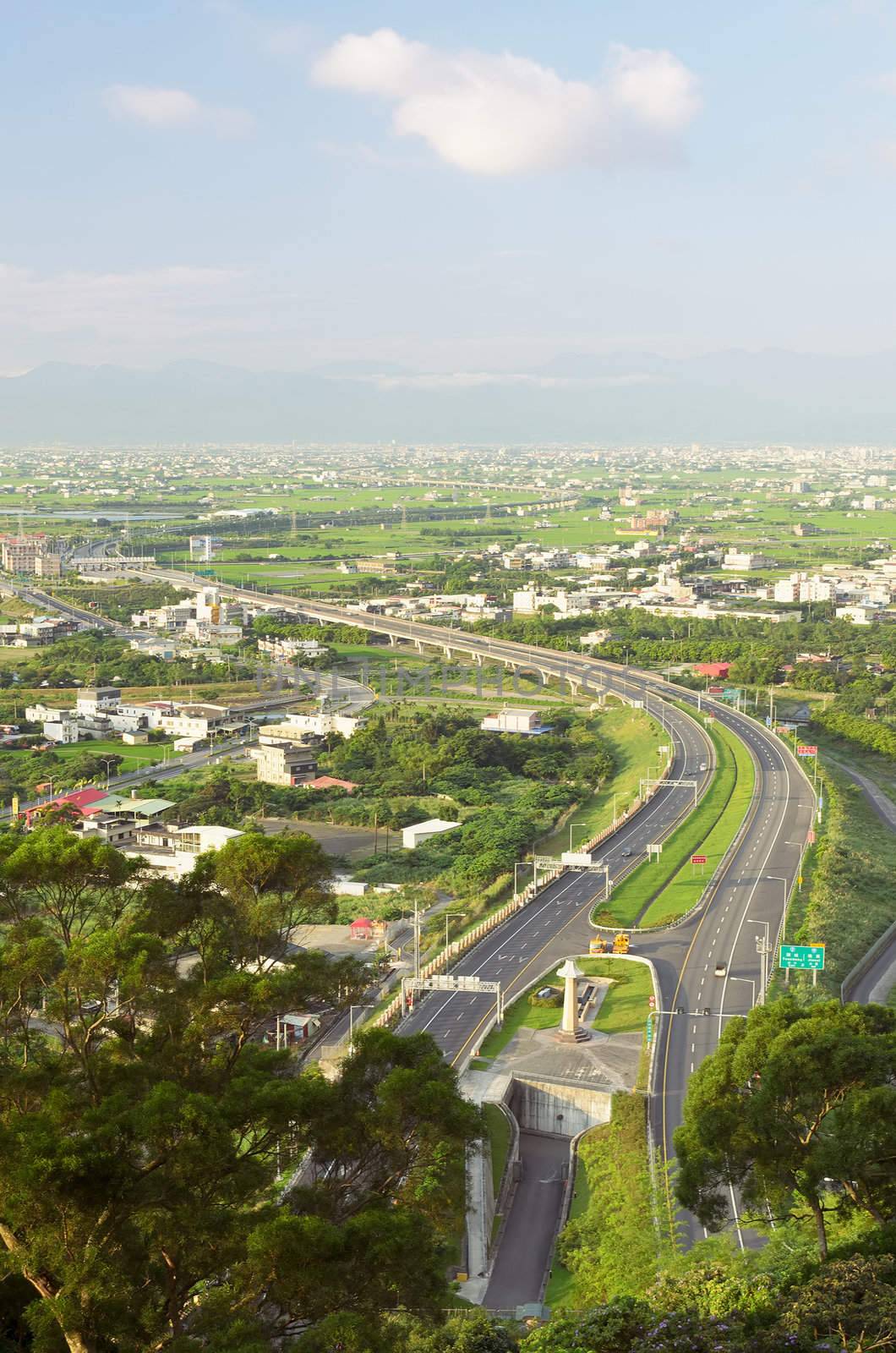 Highway under blue sky, Taipei-Ilan Section of National Free way No.5, Yilan, Taiwan, Asia.