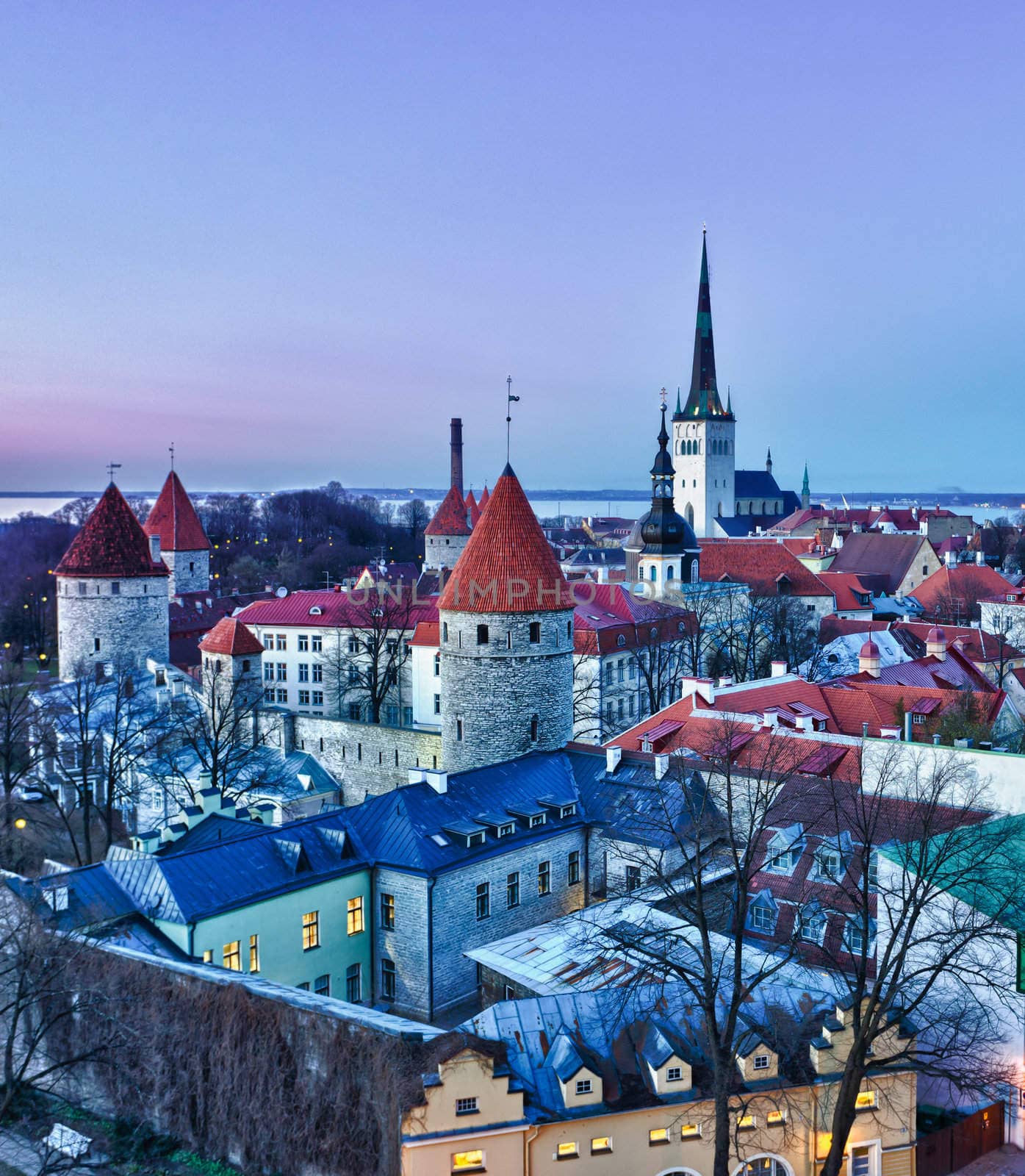 Capital of Estonia, Tallinn is famous for its World Heritage old town walls and cobbled streets. The old town is surrounded by stone walls and distinctive red roofs and glows at dusk