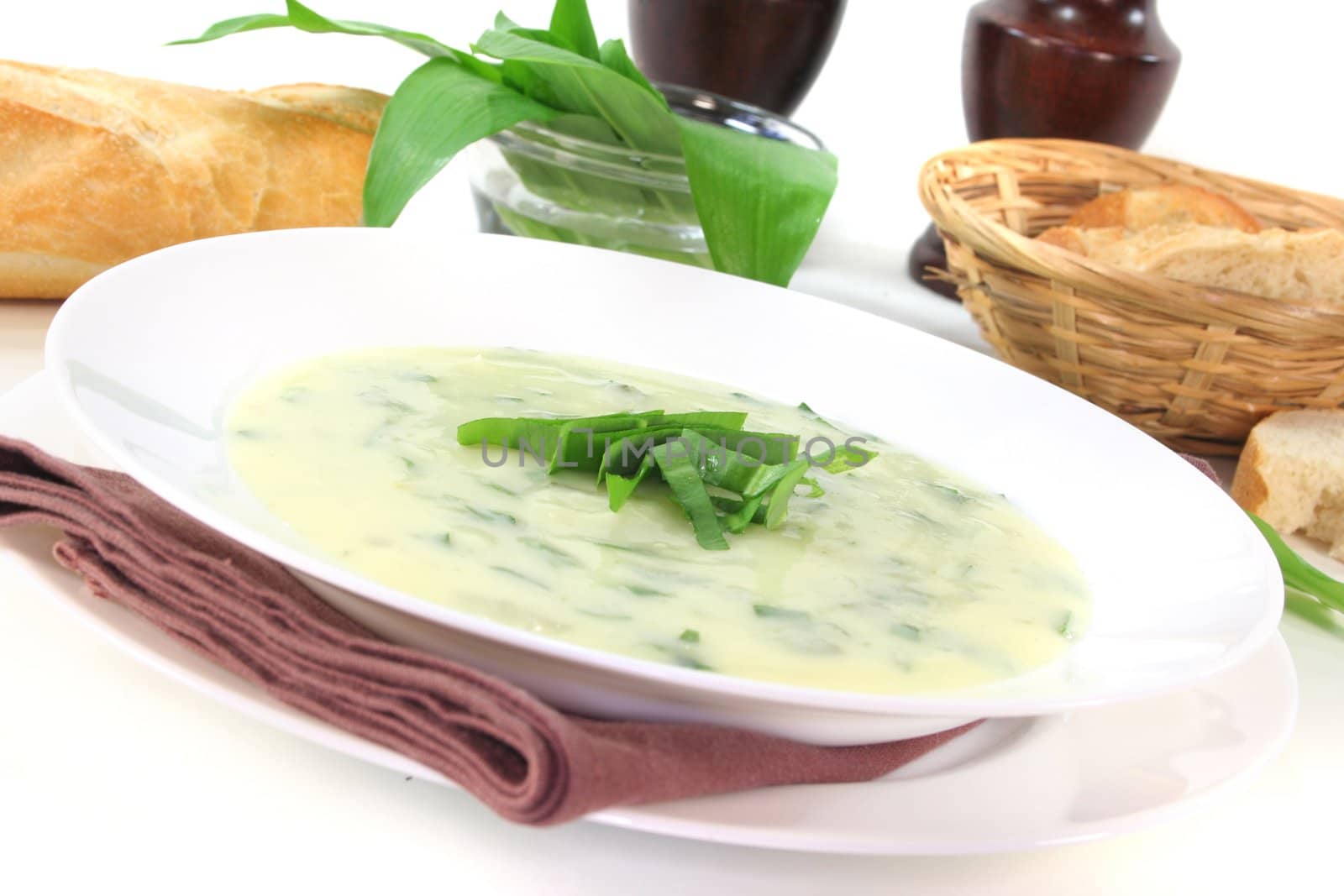 Wild garlic soup with fresh wild garlic and baguette