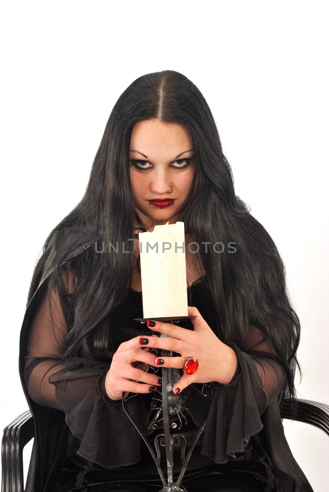 Gothic girl with large candle