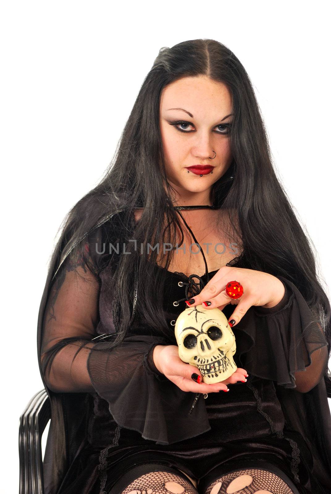 evil woman in blackwith skull