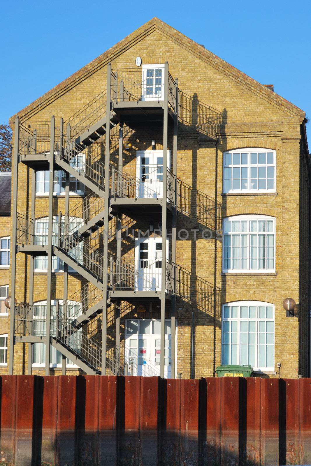 Riverside warehouse with fire escape