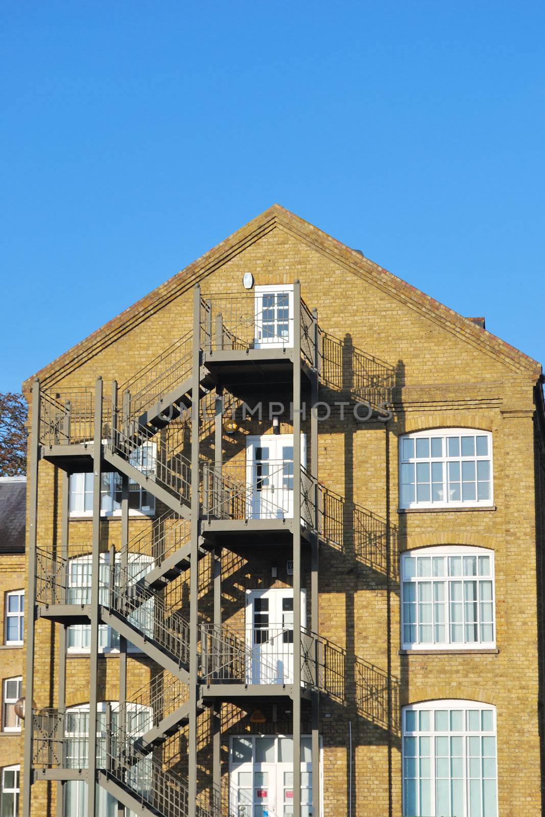 Brick warehouse building with fire escape