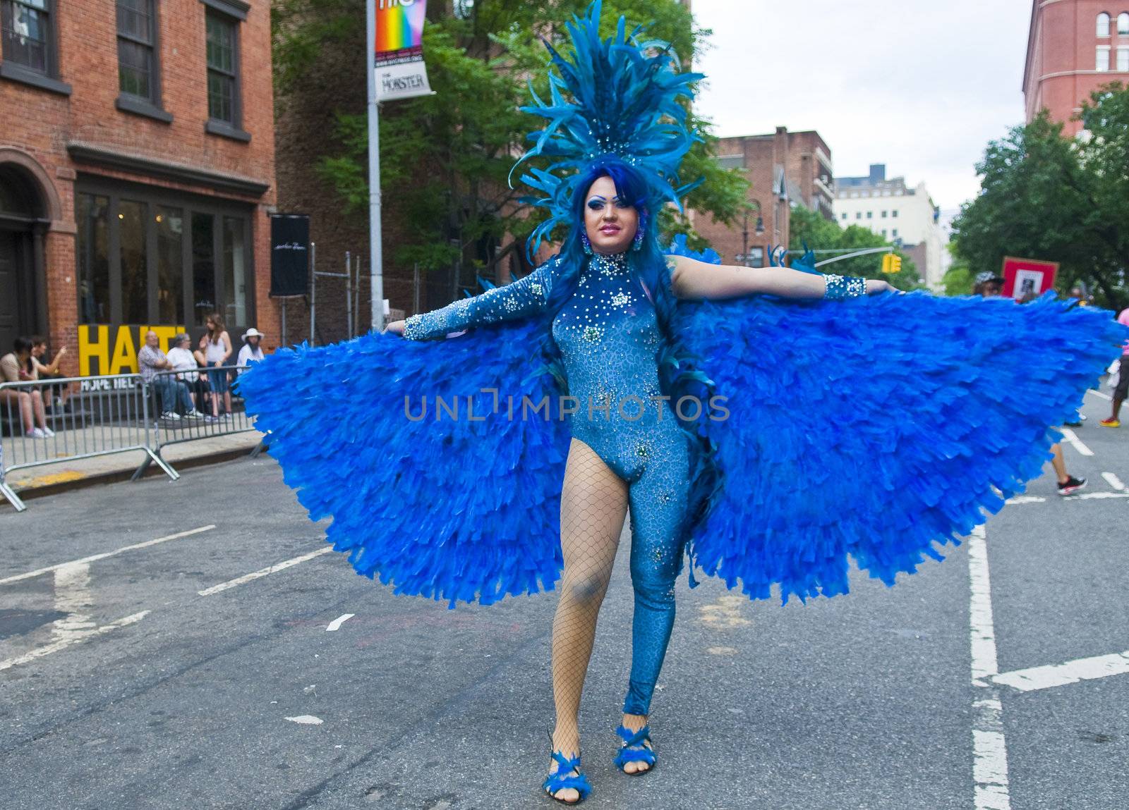 NEW YORK -  JUNE 26 : An unidentified participant celebrates gay pride parade after passing the same sex marrige bill in New York city on June 26 2011.