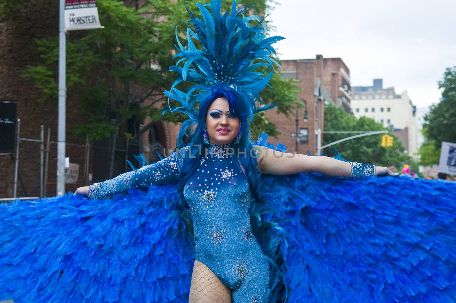 NEW YORK -  JUNE 26 : An unidentified participant celebrates gay pride parade after passing the same sex marrige bill in New York city on June 26 2011.