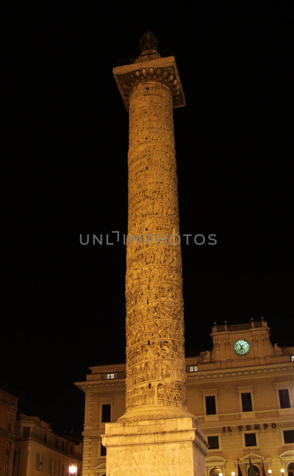 The Column of Marcus Aurelius, located in Piazza Colonna, Rome, Italy. Shot at night.
