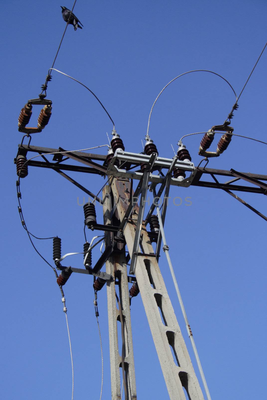 Electrical tower on a background of the blue sky