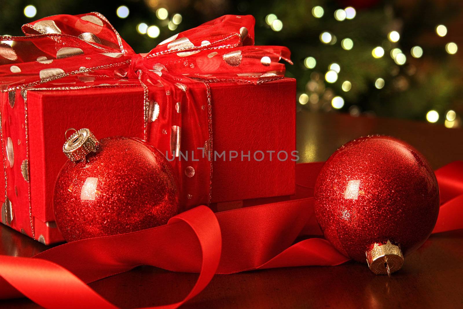 Red Christmas gift with ornaments by Sandralise