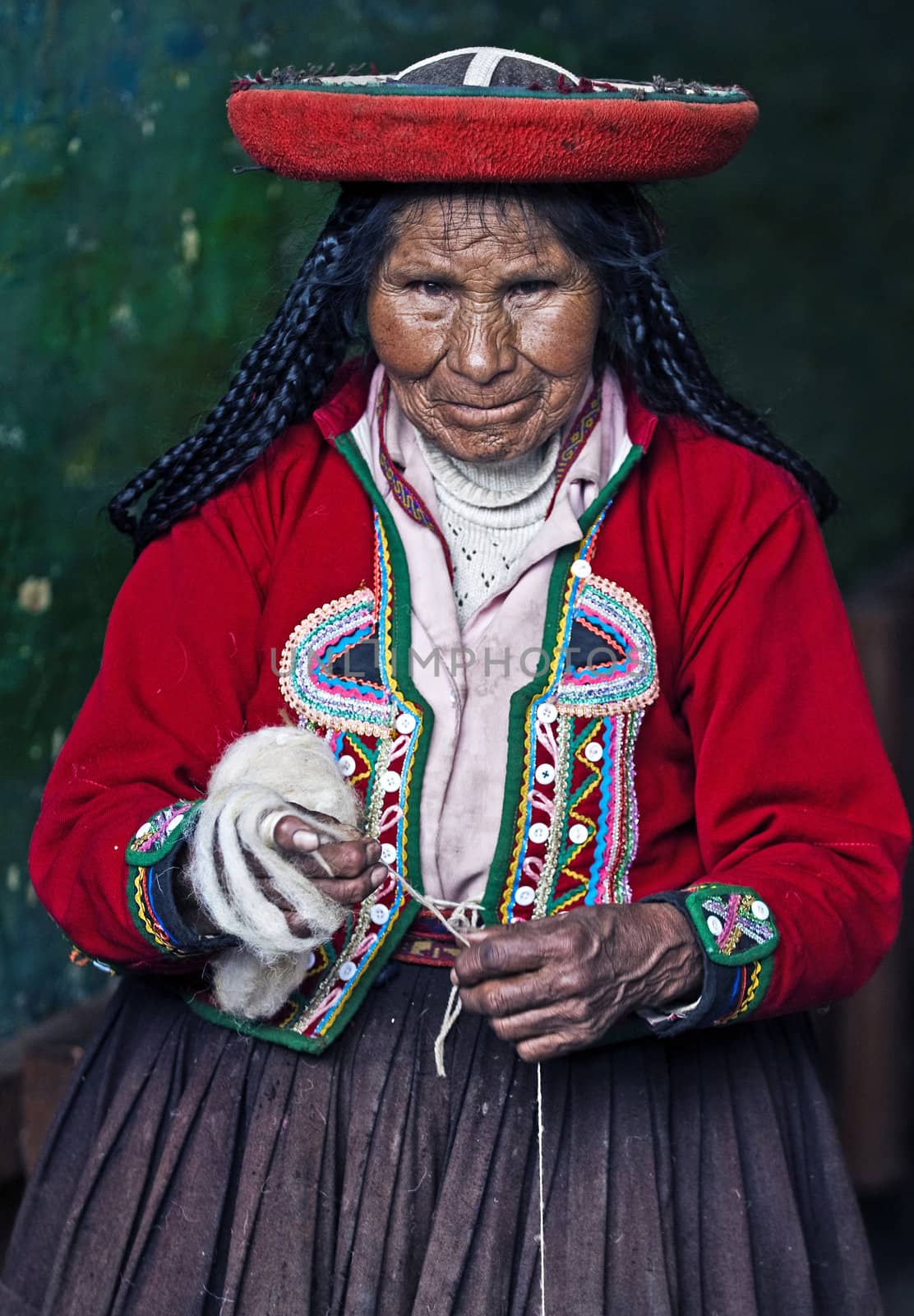 Cusco , Peru - May 26 2011 : Quechua Indian woman weaving 