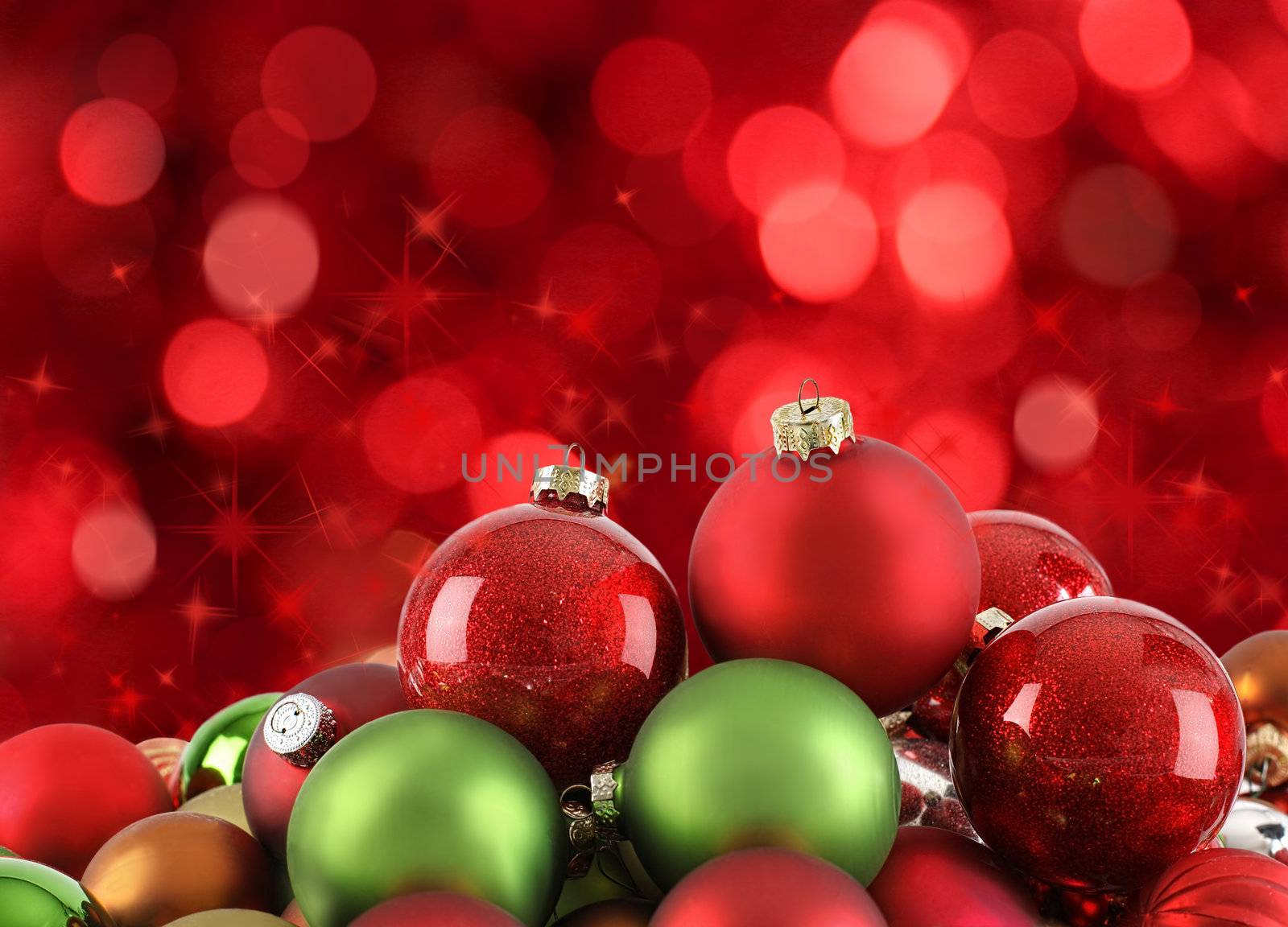 Christmas ornaments on abstract light background by Sandralise