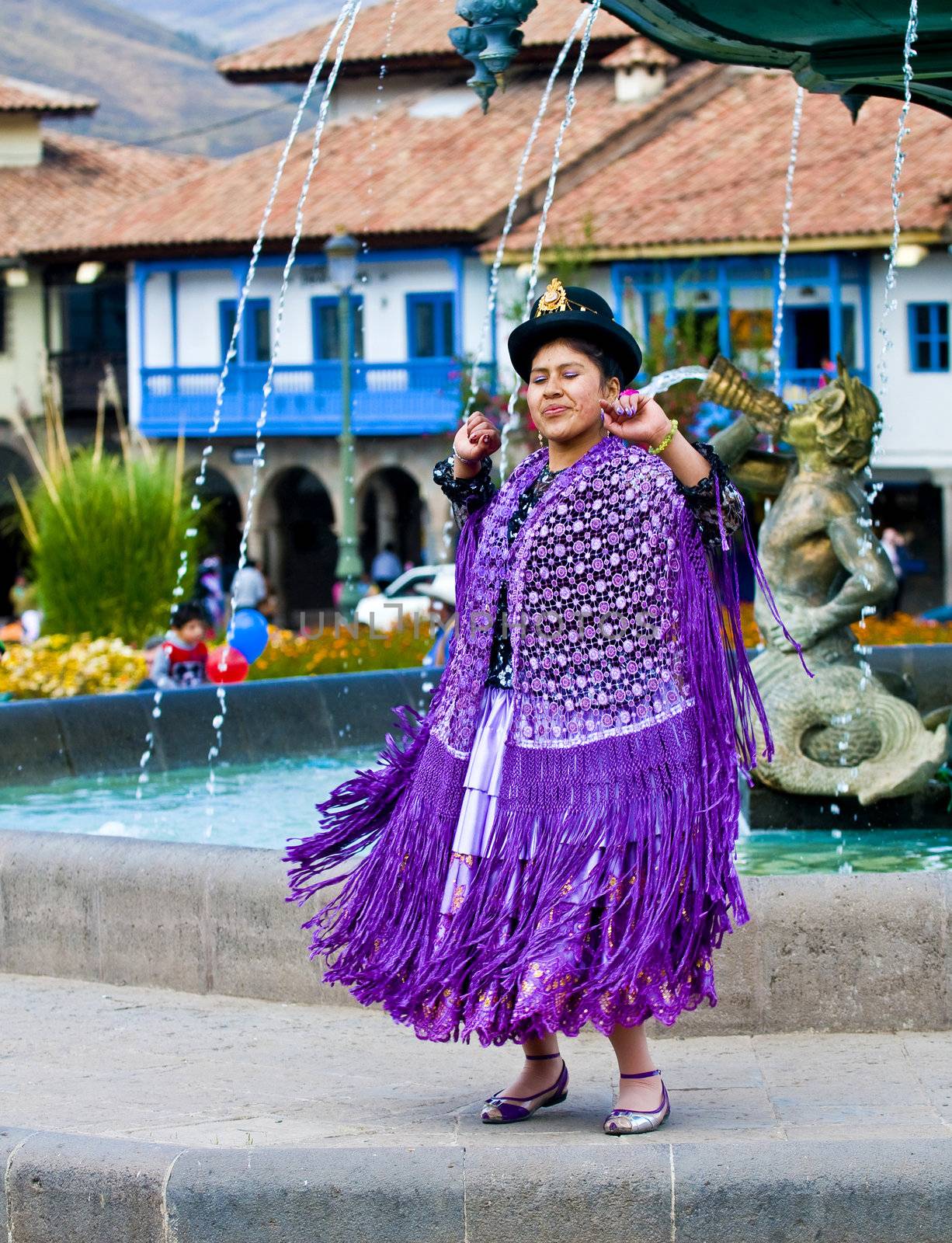 Cusco , Peru - May 25  : Peruvian dancer with traditional clothes dancing in street in Cusco Peru on May 25 2011