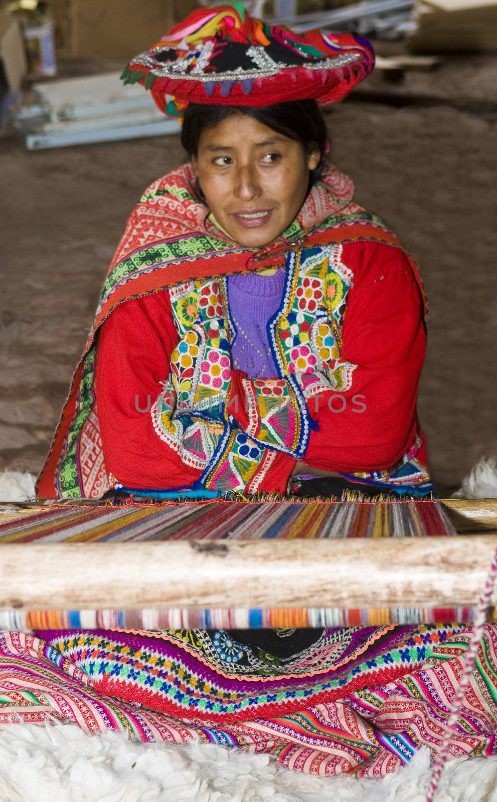 Peruvian woman weaving by kobby_dagan