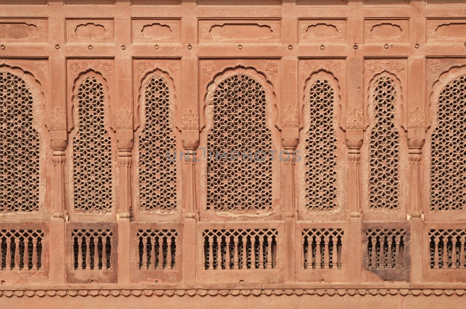 Elaborately carved red sandstone windows of Junagarh Fort in Bikaner, Rajasthan, India