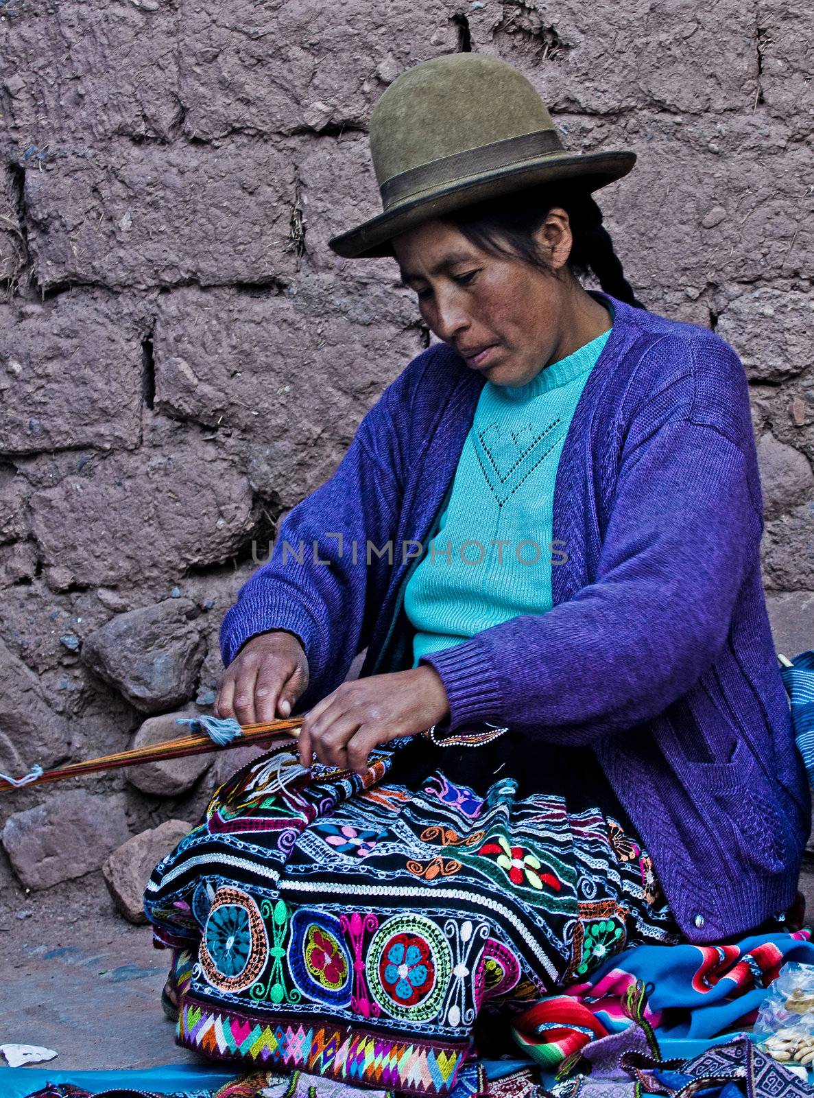 Peruvian woman weaving by kobby_dagan