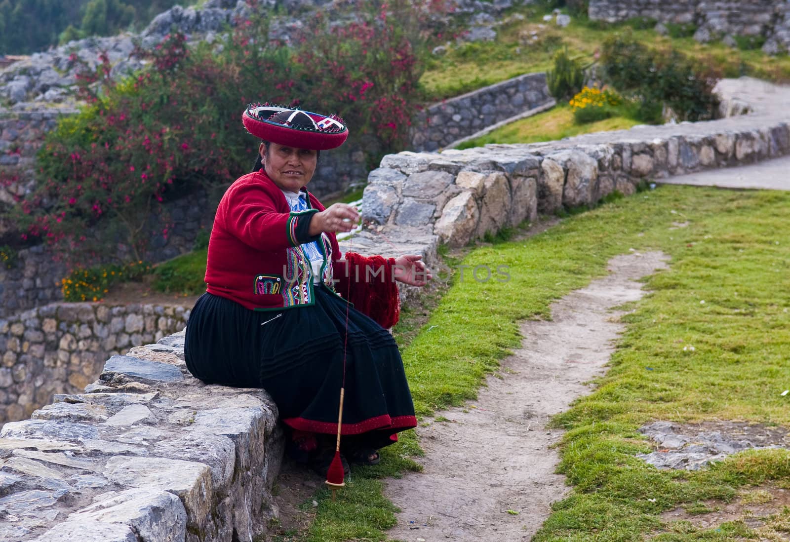 Peruvian woman weaving by kobby_dagan