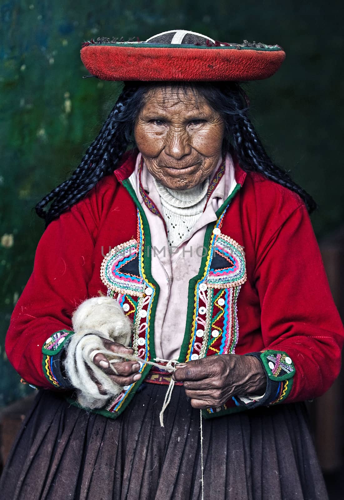 Peruvian woman weaving by kobby_dagan