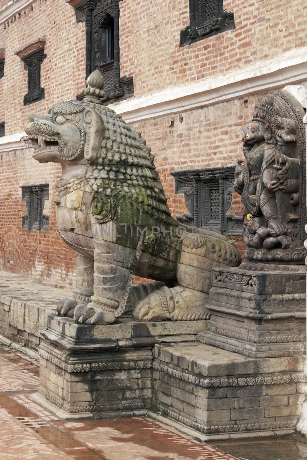 Statue of mythical beast guarding the entrance to the Royal Palace in the Durbar Square, Bhaktapur, Nepal