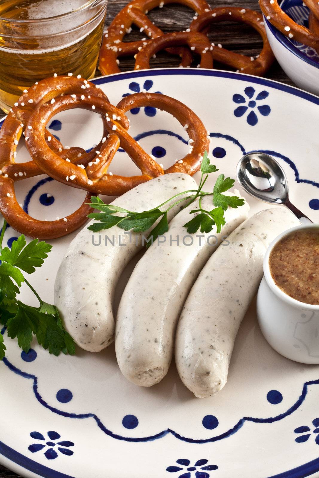 weisswurst with sweet bavarian mustard and pretzels