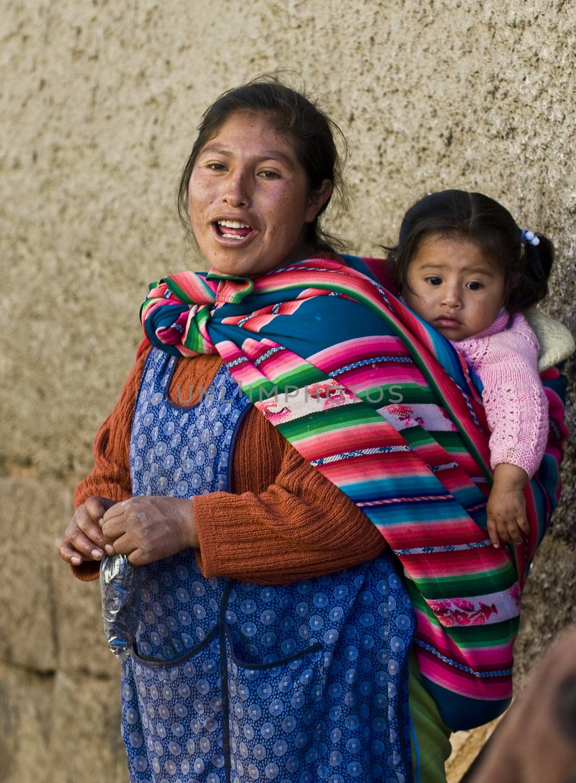 Cusco , Peru - May 28 2011 : Peruvian woman with here child in a market in Cusco Peru