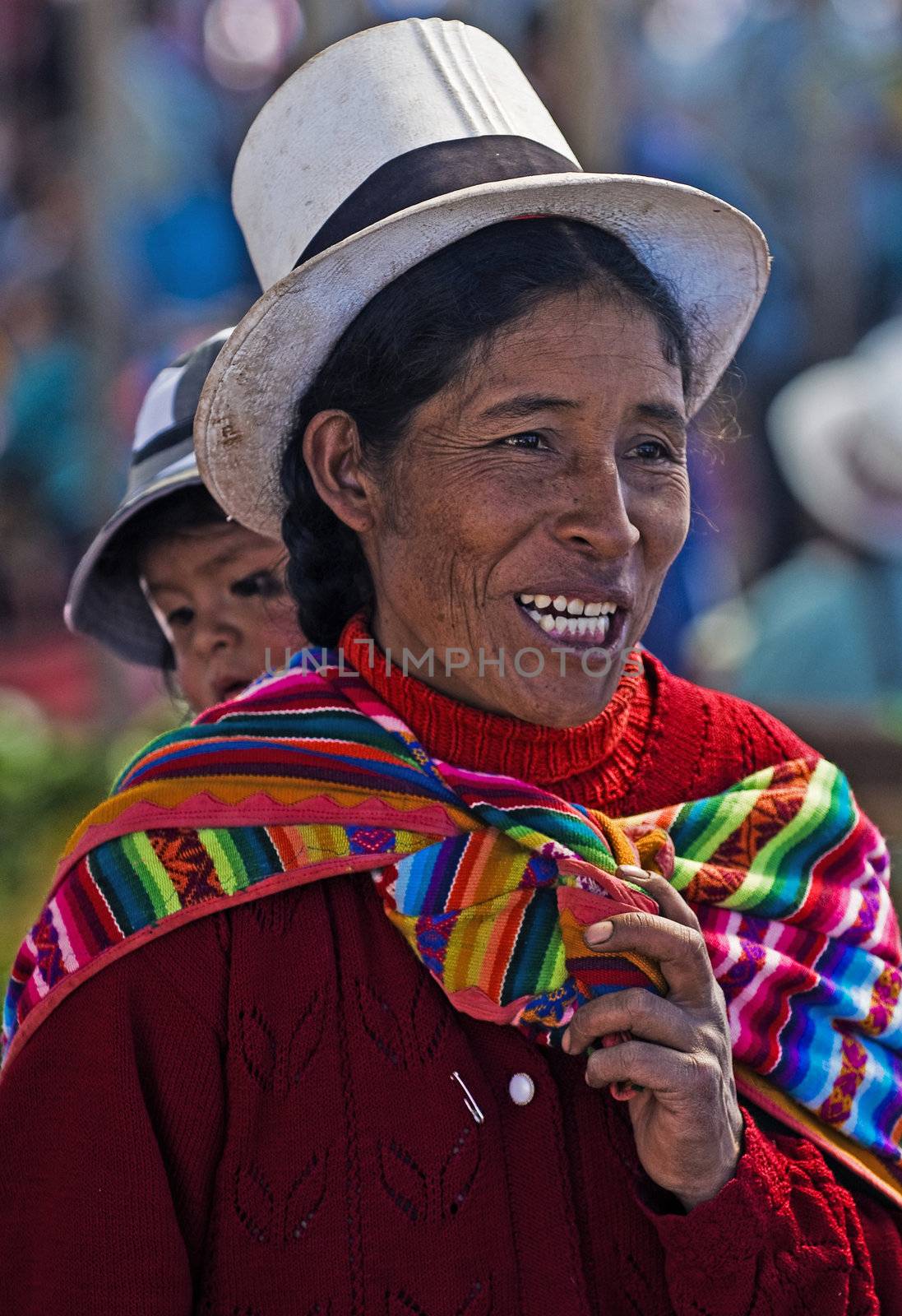 Cusco , Peru - May 28 2011 : Peruvian woman with here child in a market in Cusco Peru