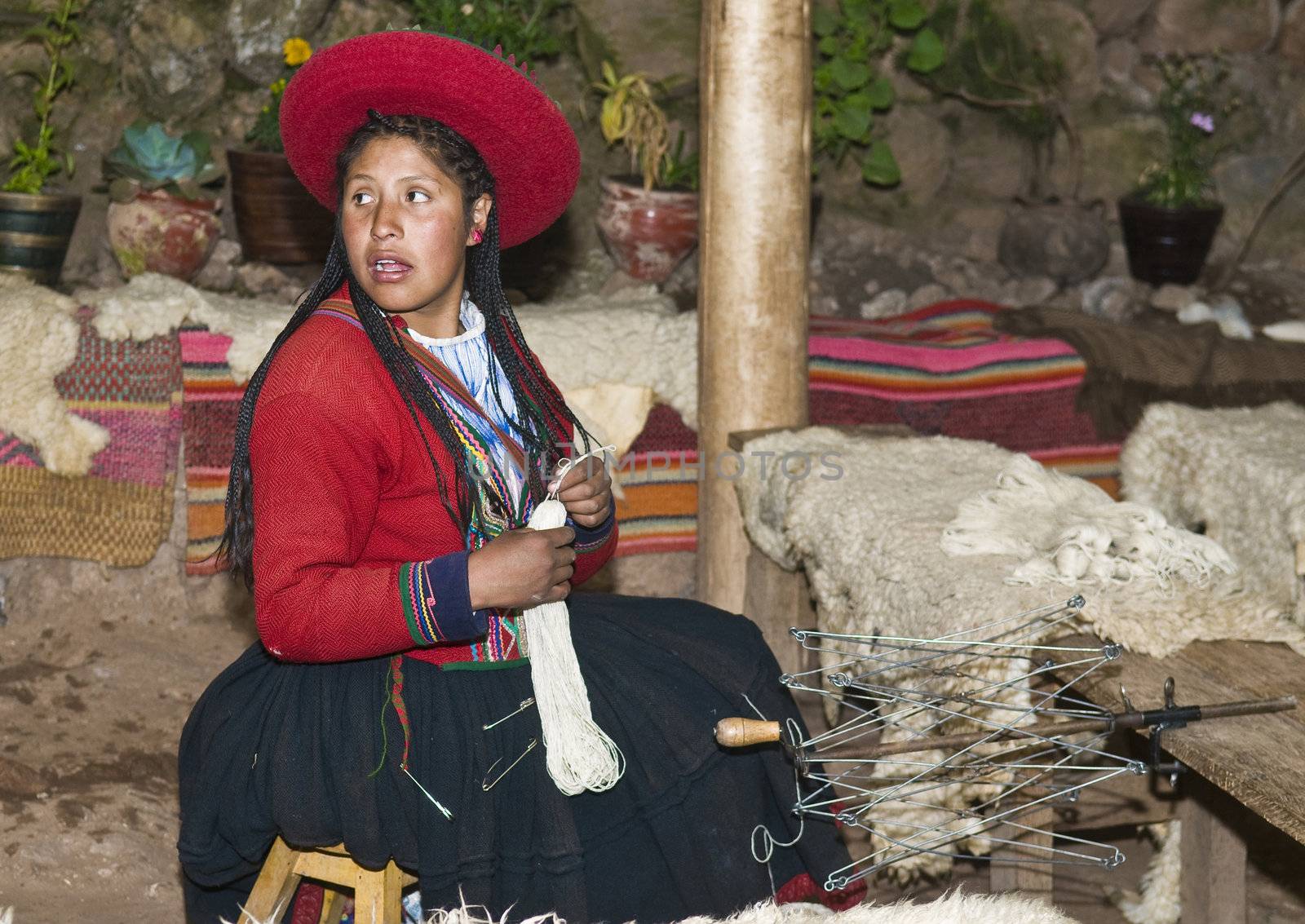 Peruvian woman weaving by kobby_dagan