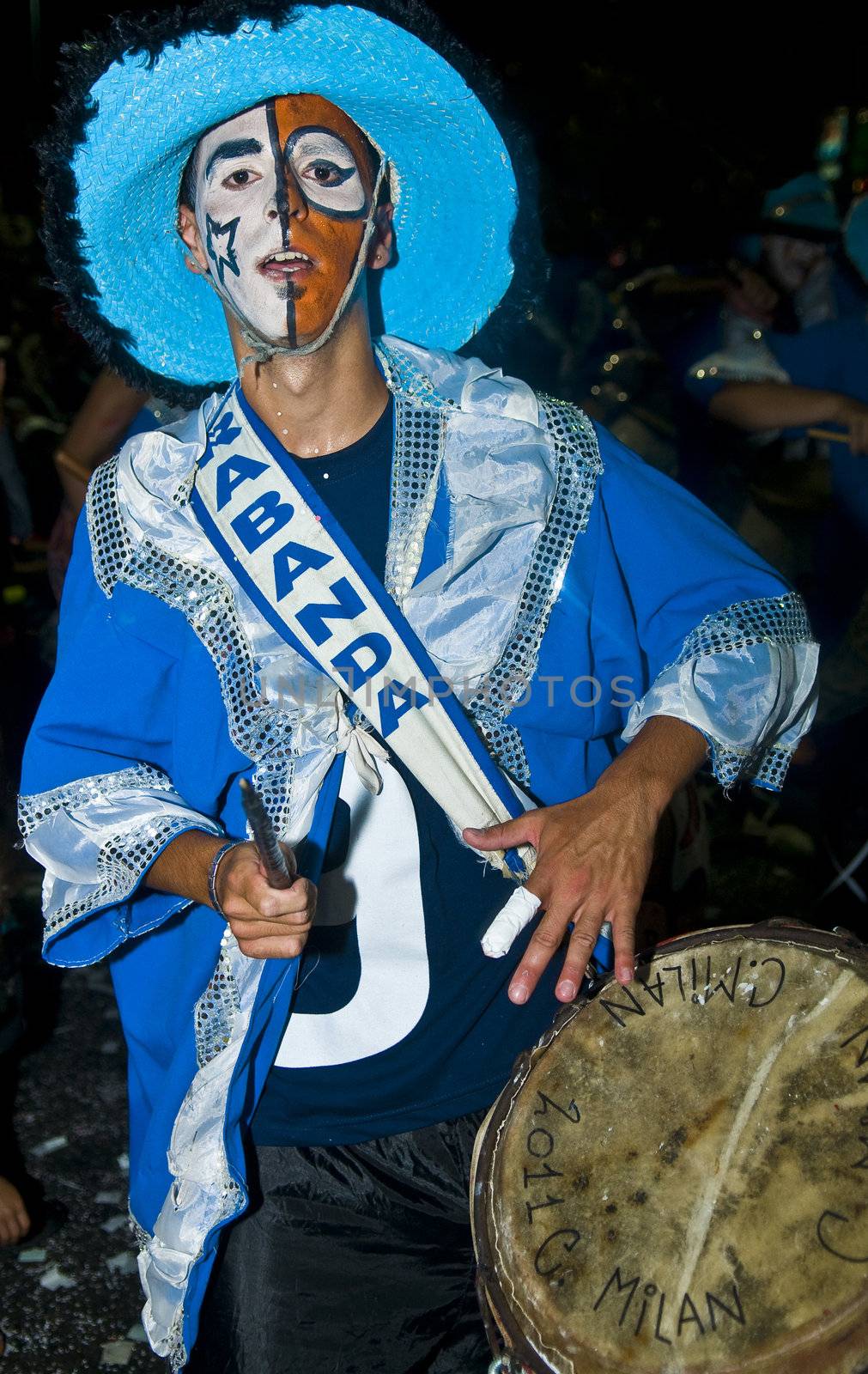 MONTEVIDEO,URUGUAY-FEBRUARY 5 2011: Candombe drummer in the Montevideo annual Carnaval ,  Candombe is a drum-based musical style of Uruguay. Candombe originated among the African population in Montevideo Uruguay