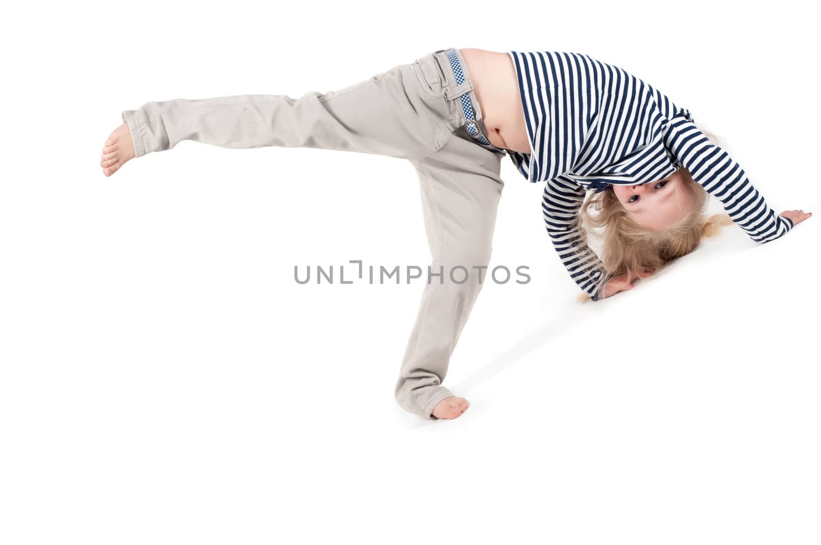 Shot of little cute girl with long hair in studio