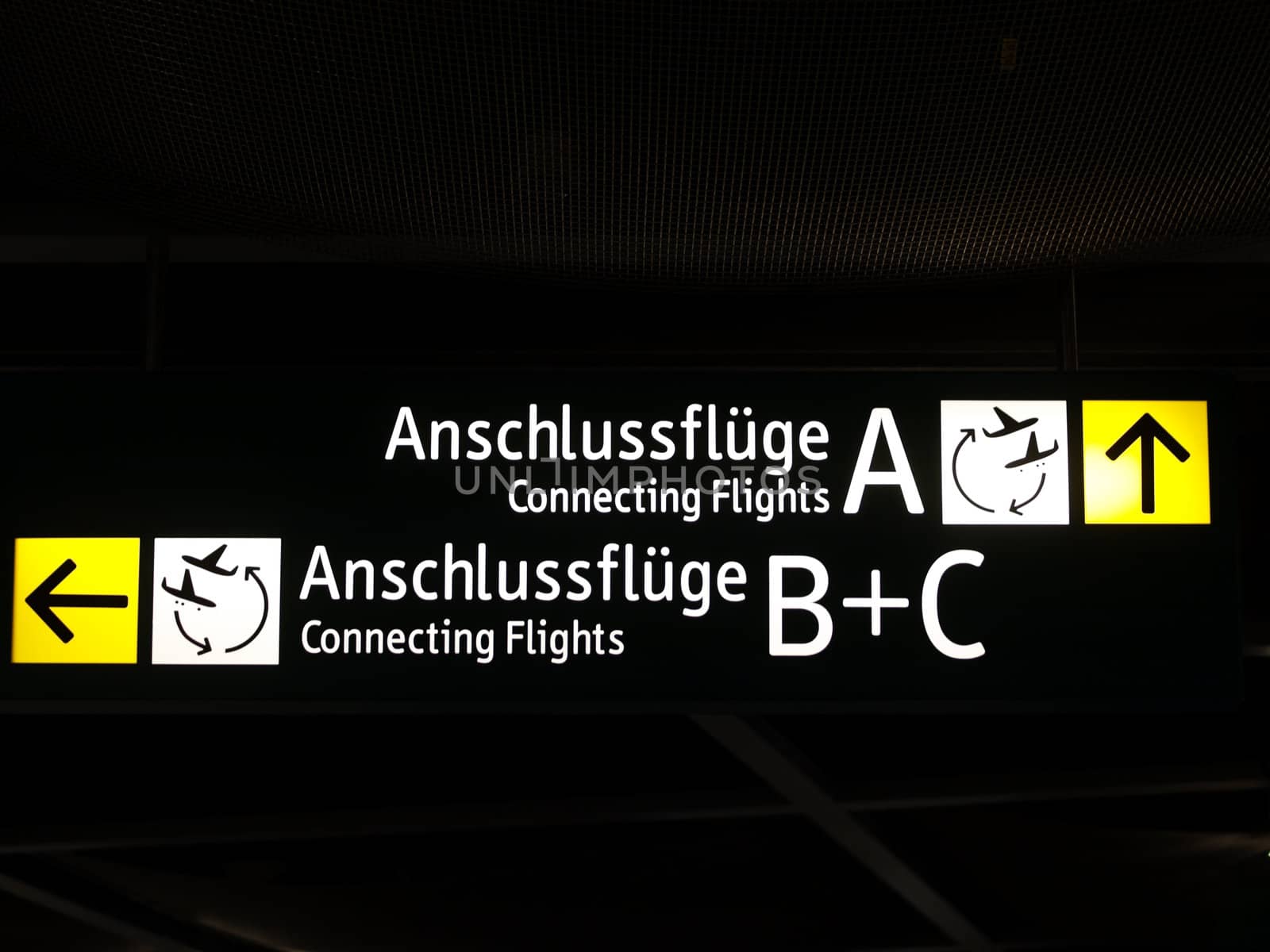 Arrival destination signs in an airport in Germany