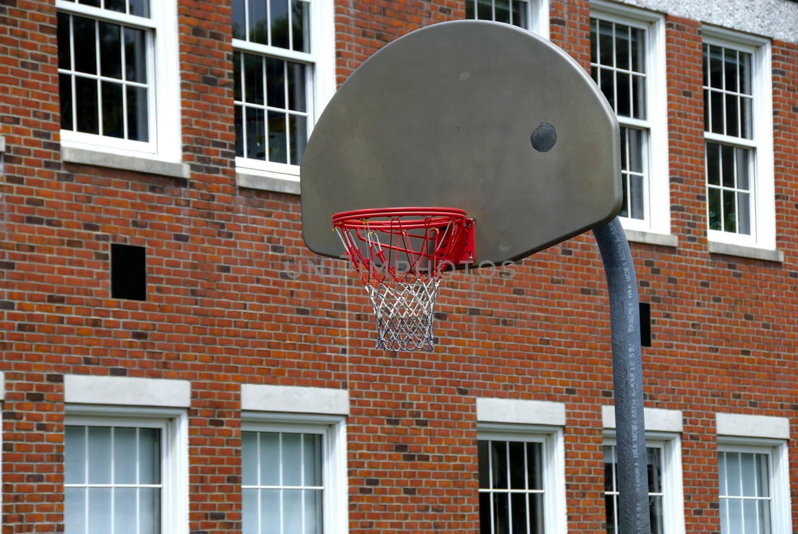 An open basket ball court in an old school