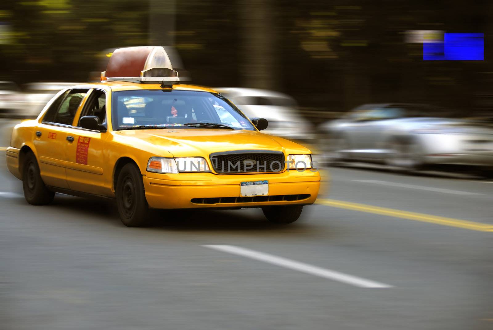 A cab on the streets of New York City with motion effects