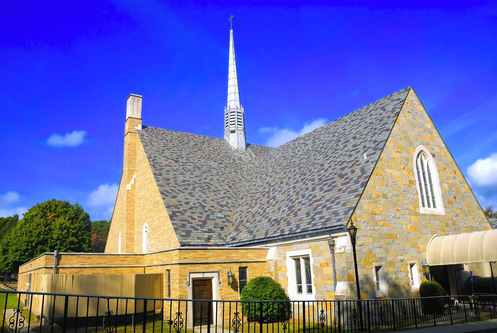 A roman catholic church on a bright summer day