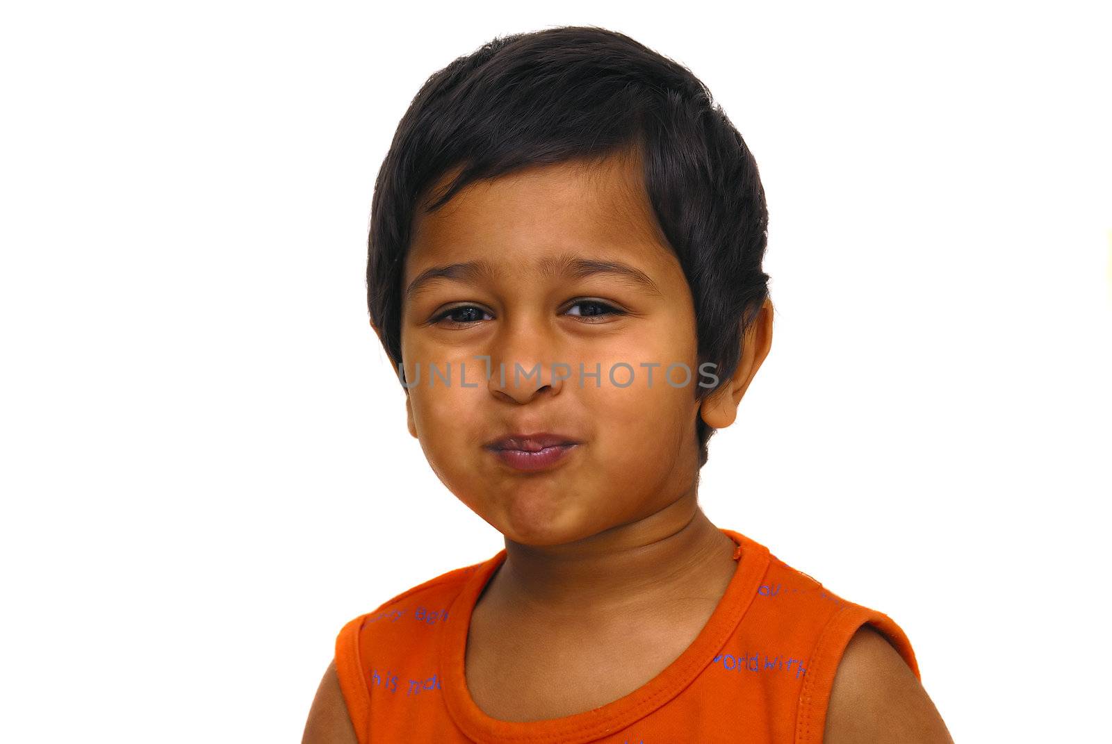 An handsome indian kid playing pranky face