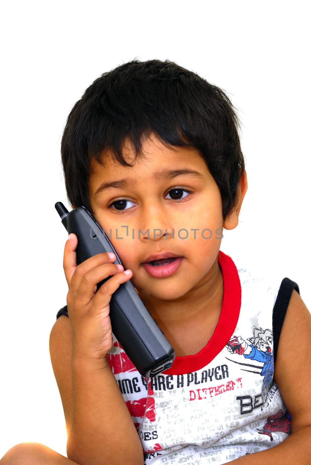 A handsome young boy taking passionately on phone